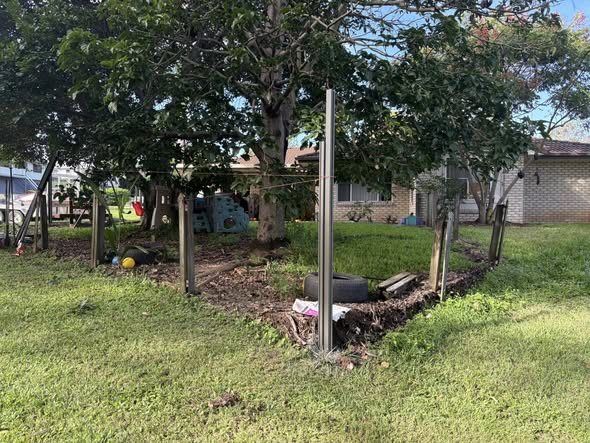 Posts set out for a fencing and retaining job
