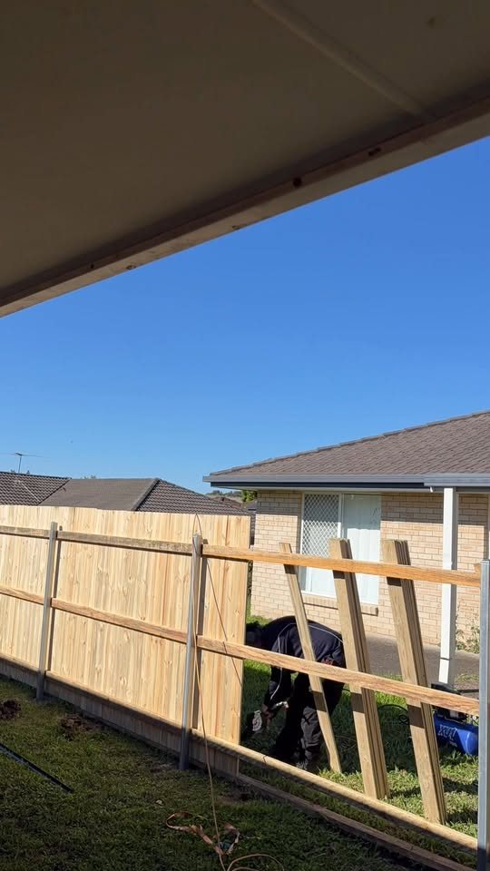 Timber paling fence going up