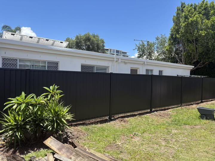 Woodland gray fence finished along a Redlands property boundary