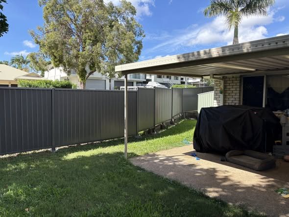 Finished fence beside a patio